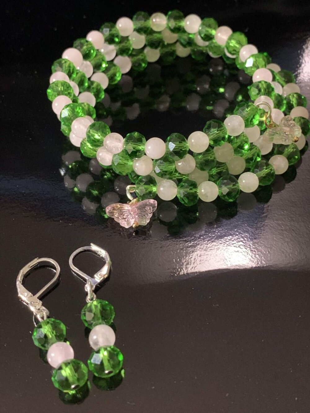 Handmade. Green glass and rose quartz beaded coil bracelet and earrings set.